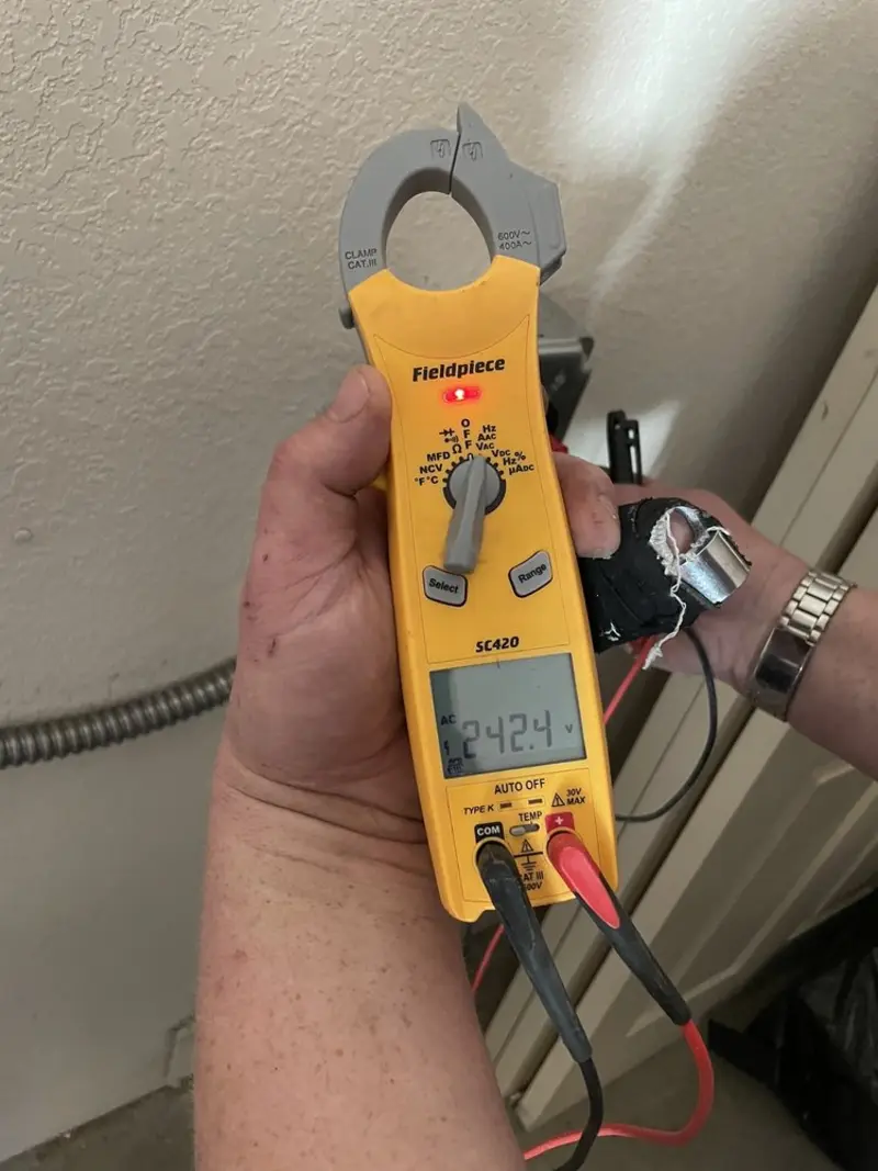 Voltage testing with clamp meter during Hot Tub / Pool Electrical Wiring in Greene